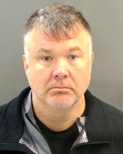 John Stewart booking photo