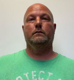 Adam Schneider booking photo